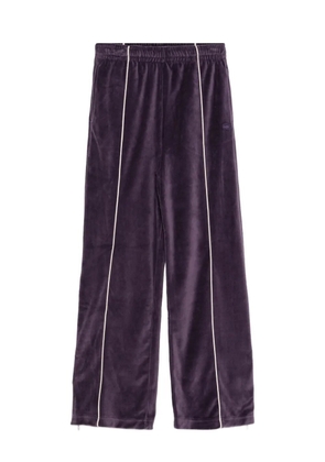 Lacoste logo-embroidered trousers - Purple