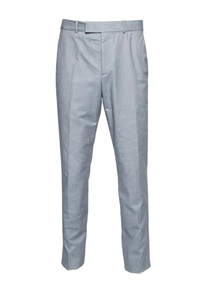 Alexander McQueen Pre-Owned checked-pattern trousers - Blue