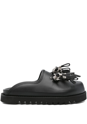 Toga Virilis tassel-embellished leather mules - Black