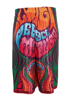 Versace Pre-Owned printed pleated shorts - Orange