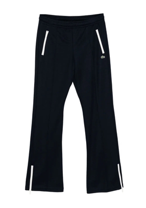 Lacoste logo-embroidered flared trousers - Blue