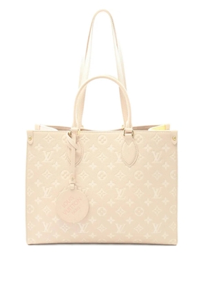 Louis Vuitton Pre-Owned 2021 On The Go MM monogram empreinte handbag - Pink