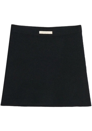 Apparis logo-patch knit mini skirt - Black