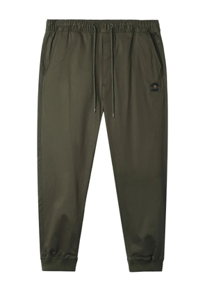 FINGERCROXX logo-patch cuffed trousers - Green