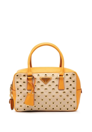 Prada Pre-Owned 2013-2025 Small Saffiano Trimmed Canvas Grommet Bauletto Bag handbag - Brown