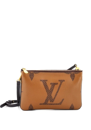 Louis Vuitton Pre-Owned Double Zip Pochette Reverse Monogram Giant clutch bag - Brown