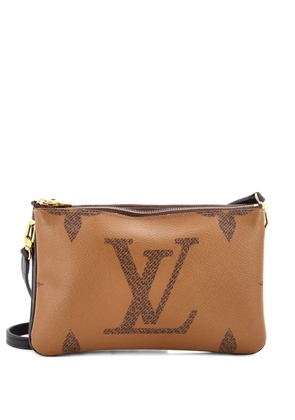 Louis Vuitton Pre-Owned Double Zip Pochette Reverse Monogram Giant clutch bag - Brown