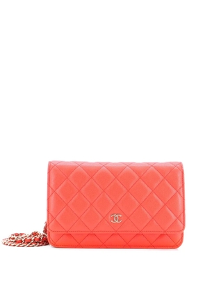 CHANEL Pre-Owned Wallet on Chain Quilted Caviar crossbody bag - Orange