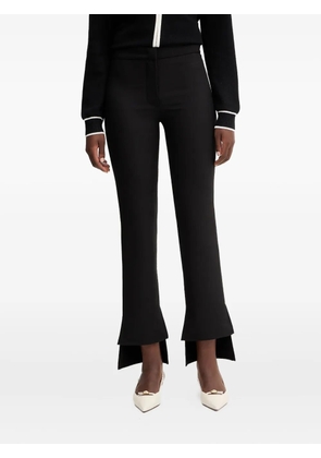 SIMONA CORSELLINI cut-out split-hem trousers - Black