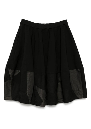 Black Comme Des Garçons patchwork skirt