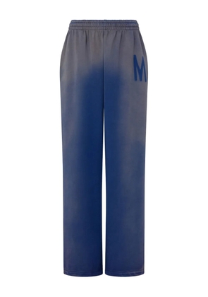 Moschino logo-detail ombre-effect track pants - Blue