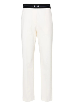 MSGM logo-waistband tapered trousers - Neutrals