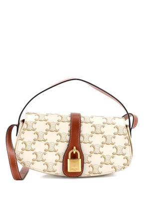 Celine Pre-Owned Tabou Clutch with Strap Triomphe Coated Canvas shoulder bag - Neutrals