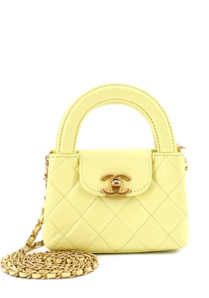 CHANEL Pre-Owned Kelly Top Handle Shopping Bag Quilted Shiny Aged Calfskin Nano crossbody bag - Yellow