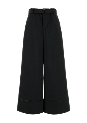 sacai welt-pockets cuffed trousers - Black