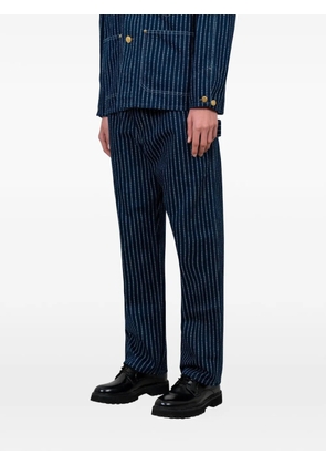 Human Made logo-pattern pinstripe jeans - Blue