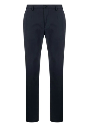 Dolce & Gabbana logo-tag tailored trousers - Blue
