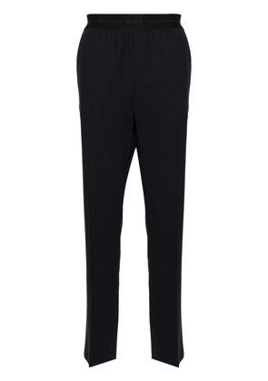 MSGM logo-waistband tailored trousers - Blue