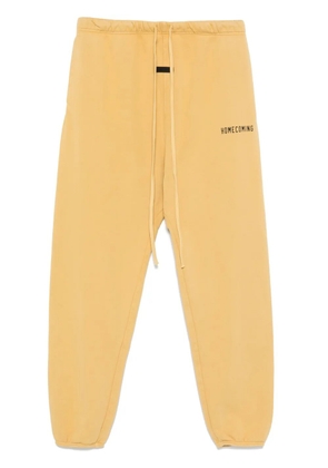 FEAR OF GOD ESSENTIALS drop-crotch track pants - Yellow