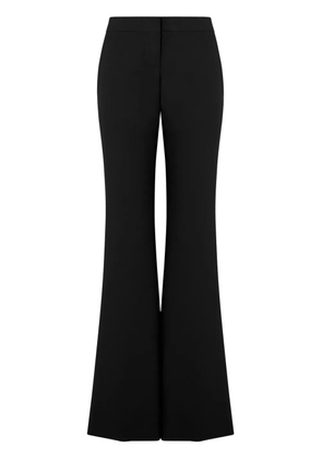 Moschino low-rise flared trousers - Black