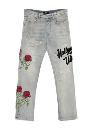AMIRI rose-embroidered distressed jeans - Blue