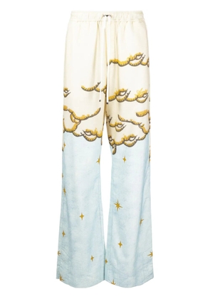 AMIRI Sunscape-print flared trousers - Yellow