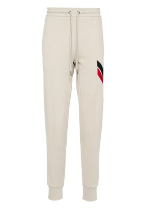 Moncler stripe-detail logo-appliqué track pants - Neutrals