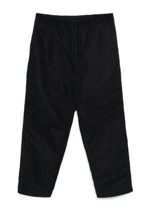 Comme des Garçons Homme tapered-leg trousers - Blue