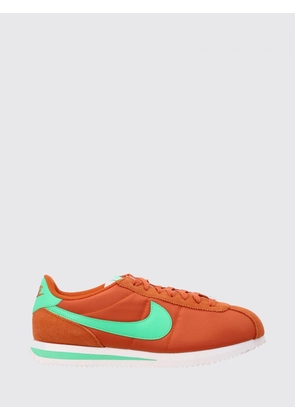 Sneakers NIKE Men color Orange