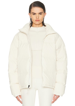 The North Face x SKIMS 1996 Nuptse Jacket in SK Bone - Ivory. Size M (also in XS, S, L, XL, XXL).