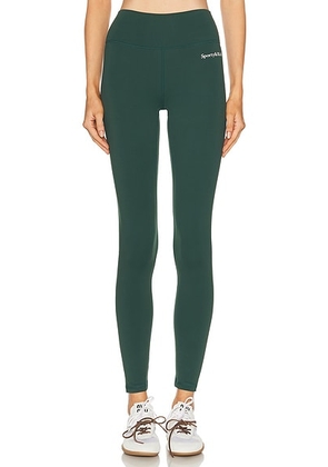 Sporty & Rich Serif Logo Legging in Forest - Dark Green. Size M (also in XS, L).