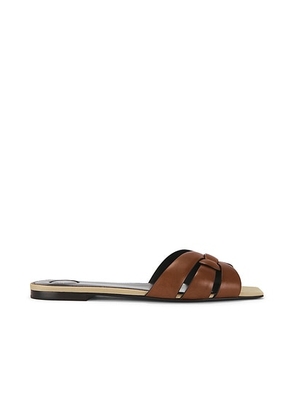Saint Laurent Tribute Flat Sandal in Bruciato - Brown. Size 36 (also in 36.5, 37, 37.5, 38, 38.5, 39, 39.5, 40, 41).