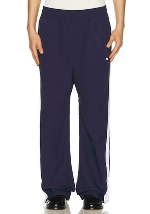 Rhude Sailing Competition Cuffed Hampton Track Pants in Navy & White - Navy. Size L (also in M, S, XL/1X, XXL/2X).