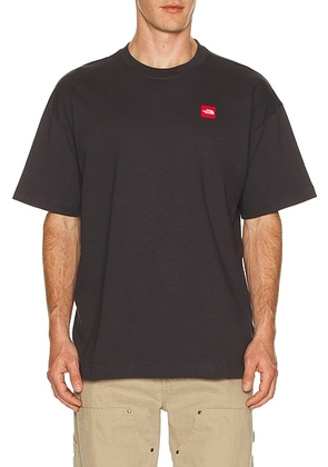 The North Face Red Box Short Sleeve Tee in Obsidian - Black. Size L (also in M, S, XL/1X, XXL/2X).