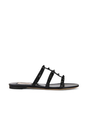 Valentino Garavani Rockstud Slide in Nero - Black. Size 36.5 (also in 36, 40).