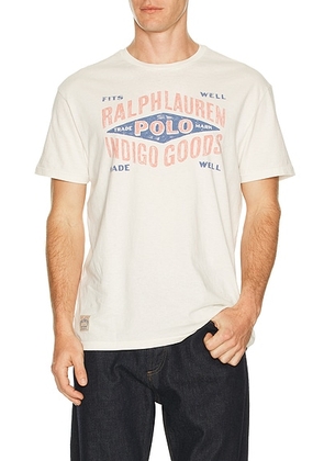 Polo Ralph Lauren Short Sleeve Uneven Jersey Knit RL Dry Goods Printed Crewneck Tee Nevis in Nevis - White. Size L (also in M, S, XL/1X, XXL/2X).
