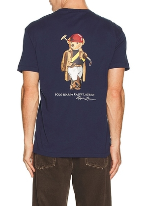 Polo Ralph Lauren Short Sleeve Jersey Knit Novelty Polo Society Bear Tee W Pocket in Newport Navy Society Bear - Navy. Size L (also in M, S, XL/1X,...