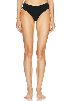 Wolford Pure Brazilian Panty in Black - Black. Size M (also in S, L).