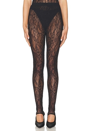 WARDROBE.NYC Lace Stirrup Legging in Black - Black. Size S (also in L, M, XL, XS, XXS).
