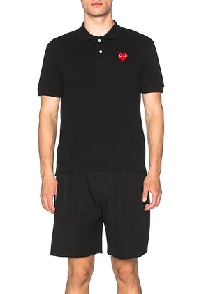 COMME des GARCONS PLAY Cotton Polo with Red Emblem in Black - Black. Size M (also in S, L).