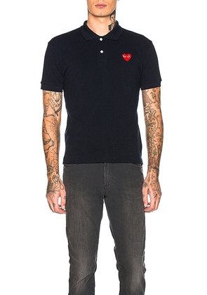 COMME des GARCONS PLAY Cotton Polo with Red Emblem in Navy - Blue. Size M (also in S, L, XL).