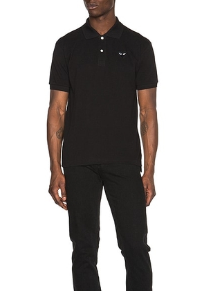 COMME des GARCONS PLAY Cotton Polo with Black Emblem in Black - Black. Size M (also in S, L).