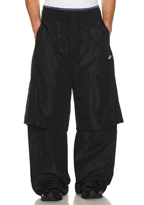 WE11DONE Triple Layered Track Pants in Black - Black. Size M (also in L, S).
