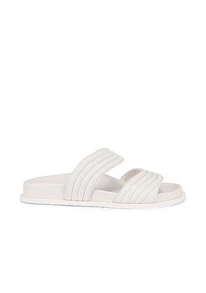 ALAÃA Leather Slides in Blanc Casse - White. Size 37 (also in 40, 36).