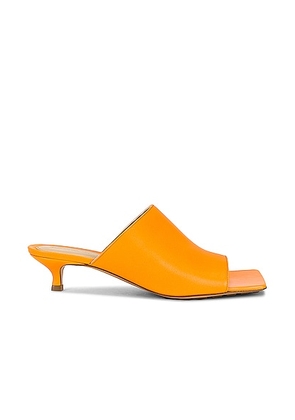 Bottega Veneta Stretch Mule Sandals in Tangerine - Tangerine. Size 37 (also in 36, 38, 38.5, 41).