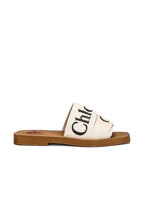Chloe Woody Flat Slides in White - White. Size 36 (also in 35, 38, 39, 40, 41, 42).