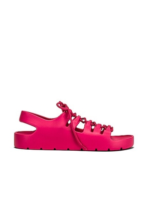 Bottega Veneta Jelly Lace Up Sandals in Cranberry - Fuchsia. Size 40 (also in 38, 41).