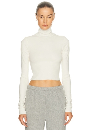 Eterne Cropped Fitted Turtleneck Top in Cream - Cream. Size XS (also in S).
