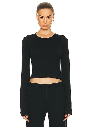 Eterne Long Sleeve Baby Tee in Black - Black. Size M (also in L, S, XL, XS).