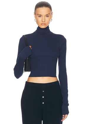 Eterne Cropped Fitted Turtleneck Top in Navy - Navy. Size XL (also in L).